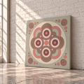 A square canvas wall art print with a retro mid-century modern geometric design, leaning against a white brick wall on a polished concrete floor.