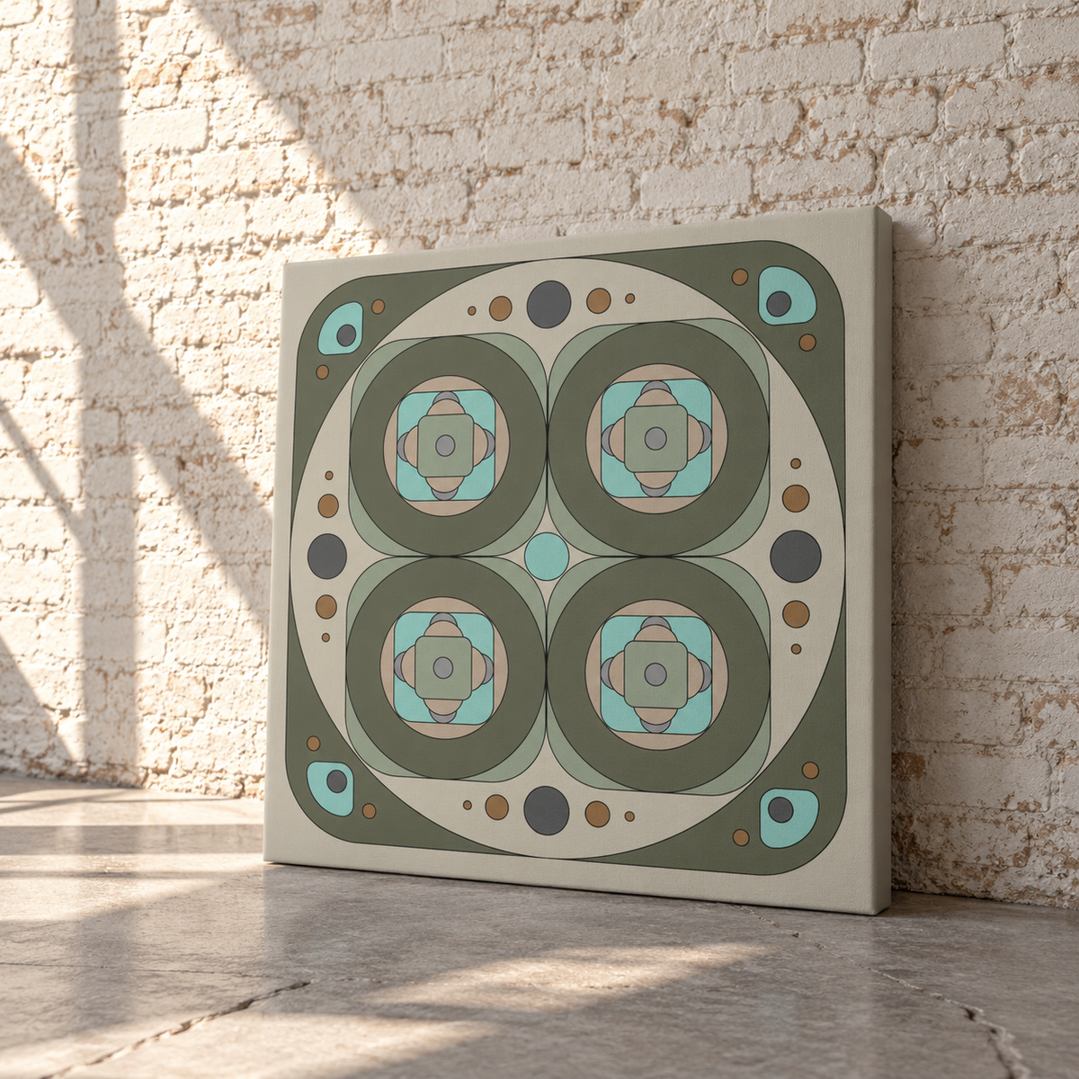 A square canvas print with a retro geometric pattern in muted olive green, beige, light blue, and gray, leaning against a white brick wall on a concrete floor.