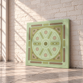 A square canvas wall art print featuring a retro geometric pattern in shades of sage green, olive, tan, and brown, leaning against a white brick wall on a concrete floor with soft window shadows.
