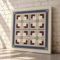 A square canvas wall art print leaning against a light brick wall on a stone floor. The artwork features a geometric tile-inspired pattern with cream, beige, slate blue, and burgundy sections.